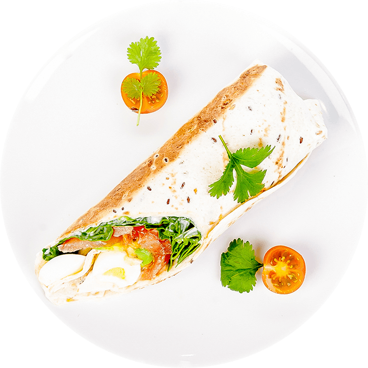 Tortilla mit Ei, Spinat, Avocado und Tomate