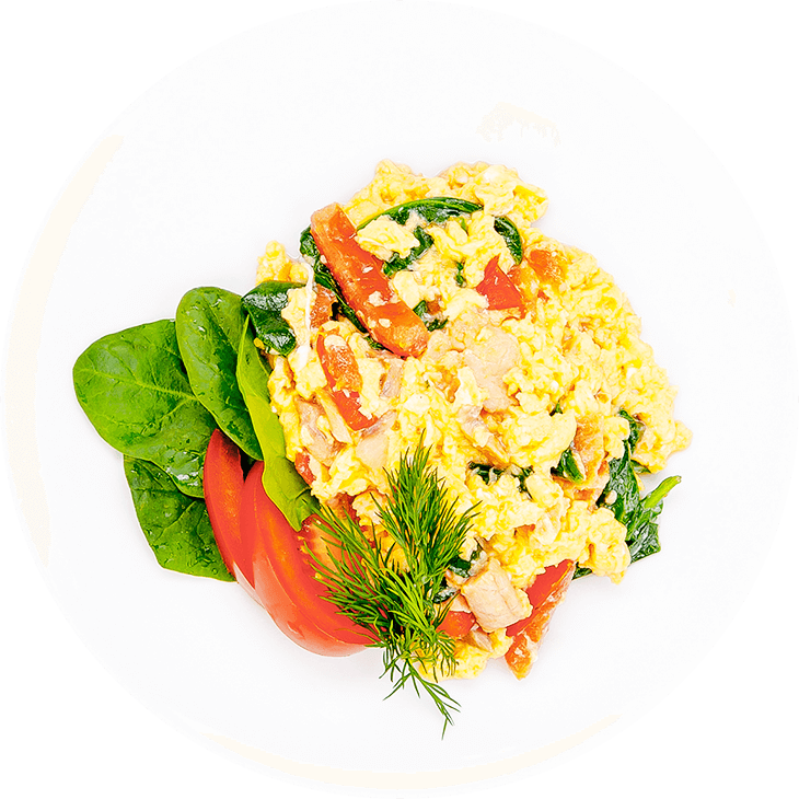 Scrambled eggs with salmon, spinach and  tomato