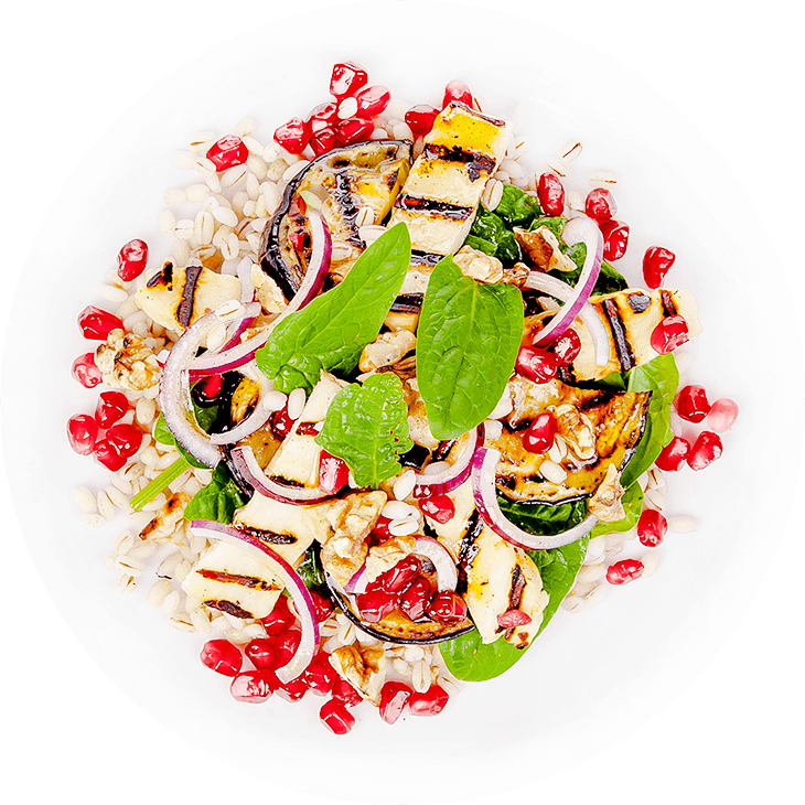 Salad with pearl barley, halloumi cheese, aubergine, pomegranate and walnuts