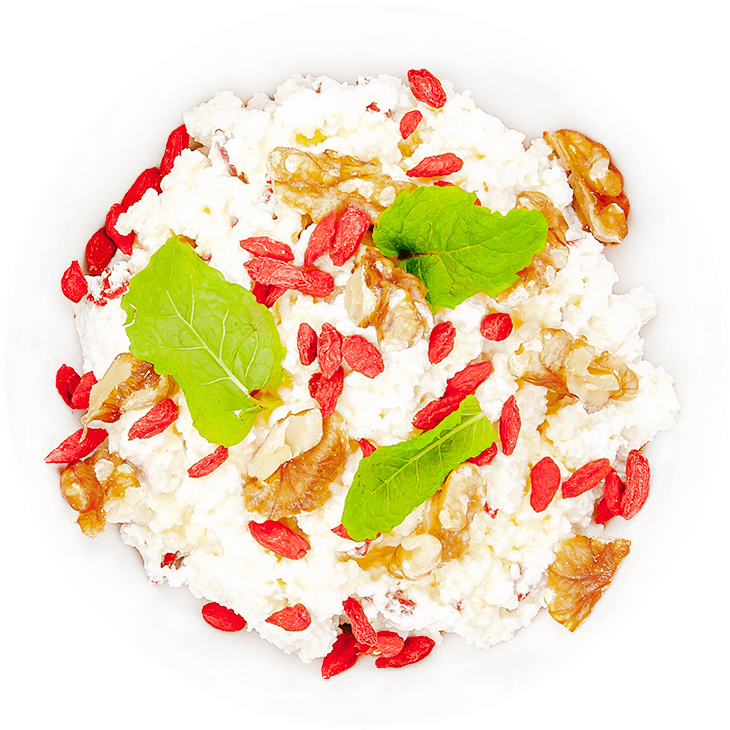 Cottage white cheese with walnuts, goji berries and honey