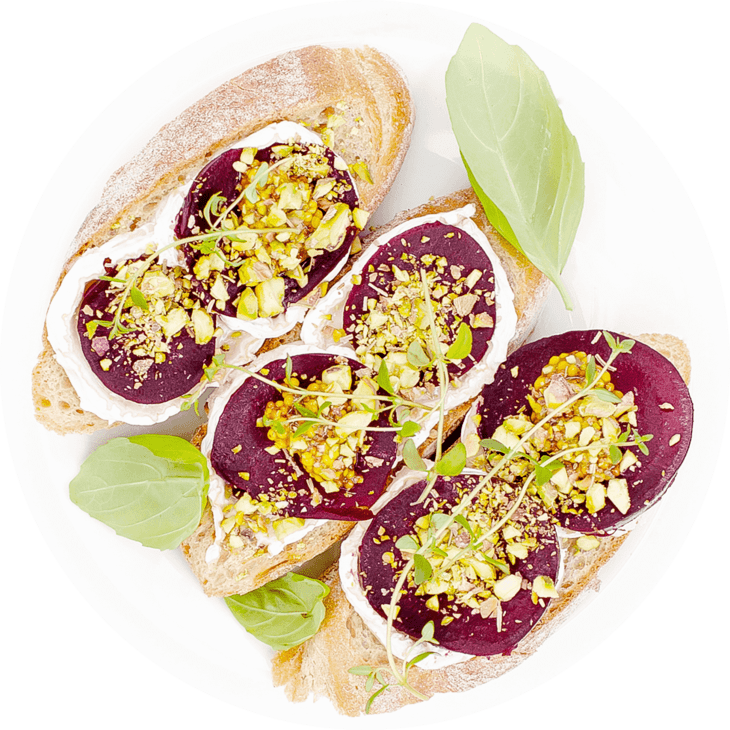 Sandwich with goat's cheese, beetroot and pistachios